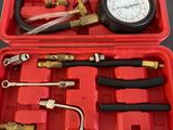 an image of a red case with tools in it on a table