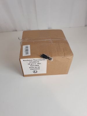 a brown box with a black handle sitting on a white surface