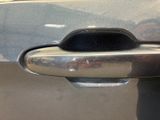 a close up of a door handle on a car
