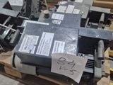 a machine that is sitting on a pallet in a warehouse