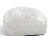 a white ball of ice on a white surface