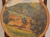 an image of a painting of a rural scene on a wooden easel