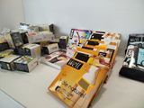 a lot of boxes of makeup products on a counter