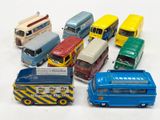 a lot of toy cars that are sitting on a table
