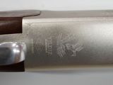 an image of a close up of a gun on a table