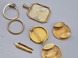 several gold rings, a ring, and a ring with a stone in it