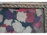 une photo d'un tableau représentant des fleurs, dans un cadre