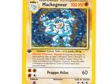 a close up of a pokemon card on a white surface