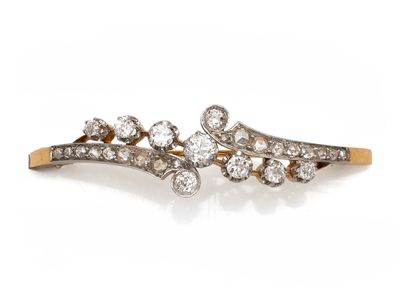 une paire de barrettes en diamant et en or