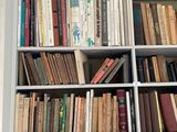 a book shelf with many books on it