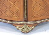 a wooden cabinet with a mirror on top of it