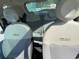 two seats in the back of a car with a view out the window
