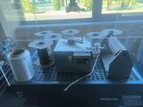 a machine that is sitting on a table in front of a window