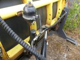 a close up of a machine with a hose attached to it
