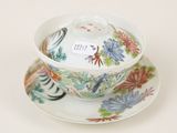 a small bowl and saucer on a saucer on a saucer