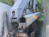 a picture of a machine that is sitting in the back of a truck