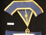 a picture of a blue and gold uniform with a star on it