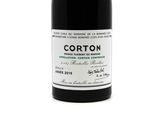 a bottle of wine that is sitting on a table