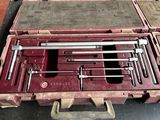 a tool case with tools in it on a table
