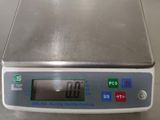 an image of a digital scale sitting on a table