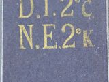 an old blue book with gold writing on it sitting on top of a table