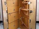 an open suitcase that is sitting on the floor
