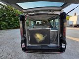 a van that has a television in the back of it