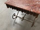 a table that has a marble top on it