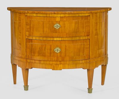 an image of a small wooden chest of drawers