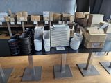 a table that has a lot of plates and cups on it
