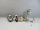 five different types of silver and silverware on the table
