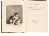 un livre sur lequel figure l'image d'un chat et d'un chien
