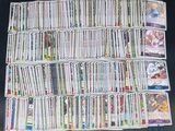a large pile of cards sitting on a table