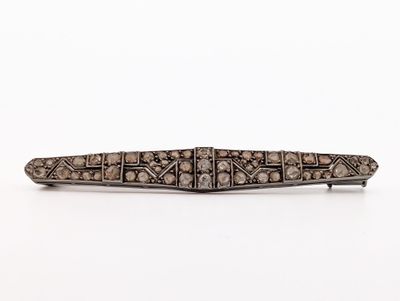 an antique silver and diamond broochle broochle