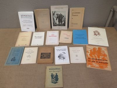 many books that are sitting on a table