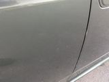 a close up of a car ' s door handle and door handle
