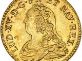 une pièce d'or portant le portrait d'un homme