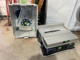two electronic equipment that are sitting on the floor