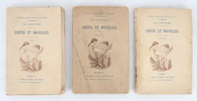 three books with illustrations on them sitting on a white surface