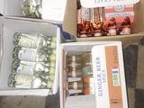 a person standing in front of a box full of food