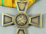 an image of a medal with a lion on the front of it