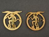 pair of gold plated brooches depicting a horse and rider