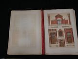 an open book with a picture of a building on it