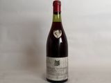 a bottle of wine that is sitting on a table