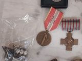 many medals and other items that are on the table