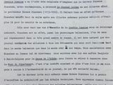 an old document with writing on it sitting on a table