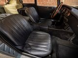 an image of the interior of a car with leather seats