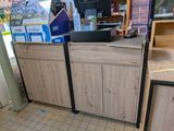a counter that has a lot of items on it