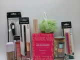 a lot of makeup products that are on the table