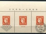 un gros plan sur un timbre sur lequel figurent trois timbres différents